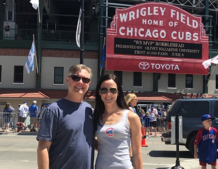 Dr. Fana and his wife at Wrigley Field